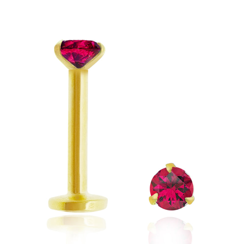 Piercing labret en or jaune avec rubis