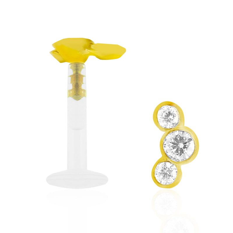Piercing tragus et hélix en or jaune avec trois zircons