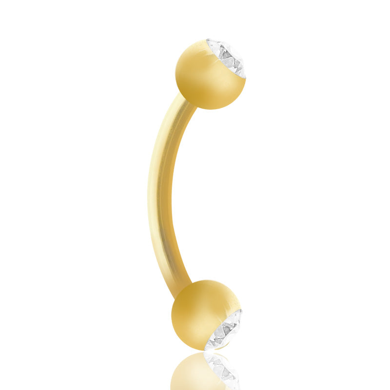 Piercing barre courbe en or jaune avec oxydes de zirconium