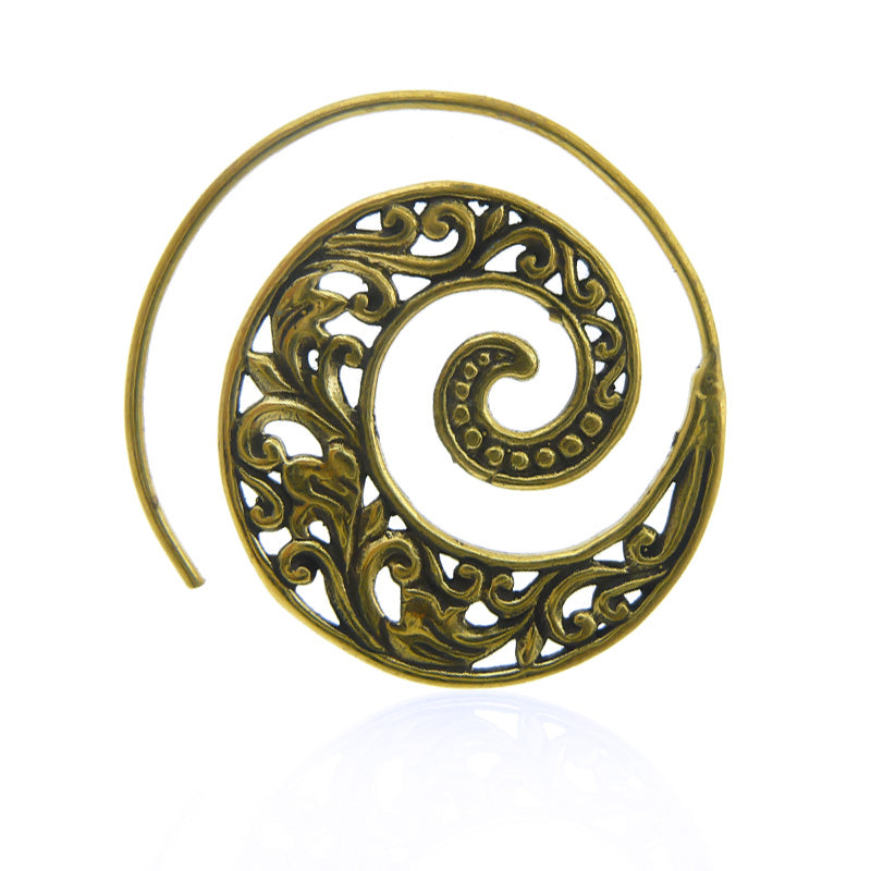 Boucle d'oreille en laiton avec arabesques