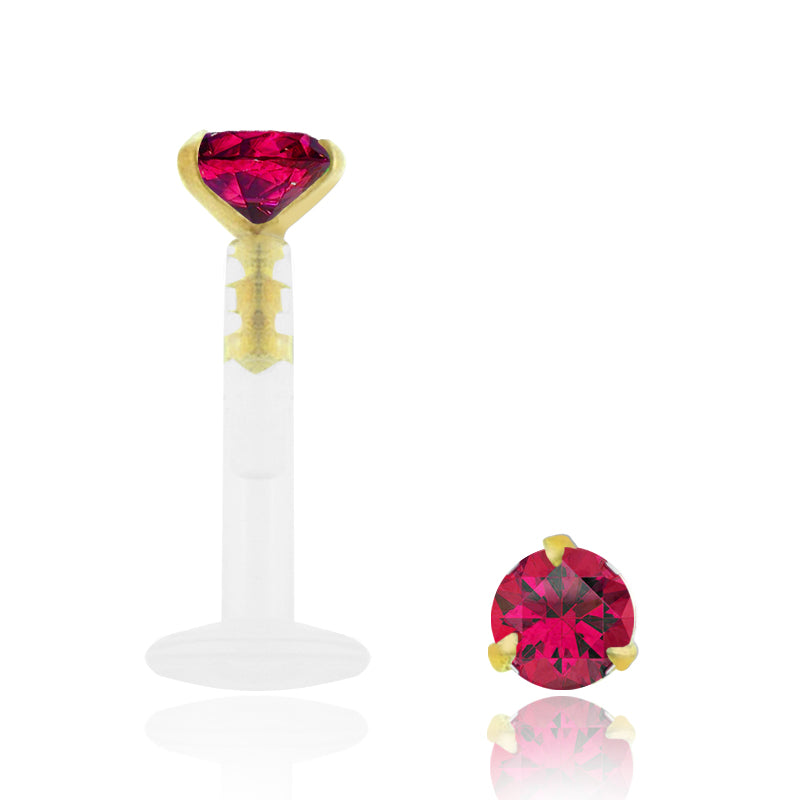 Piercing labret bioplast en or jaune avec rubis