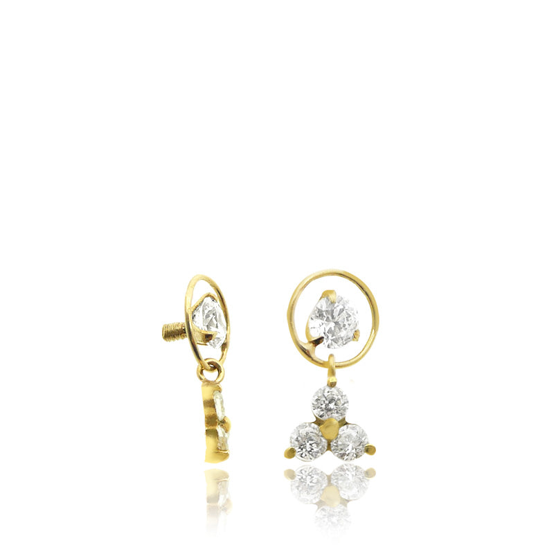 Piercing microdermal or jaune avec trèfle