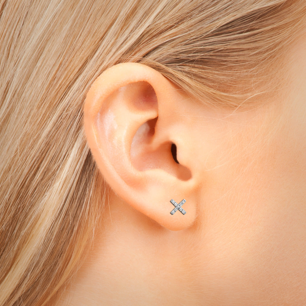 Boucle d'oreille X en acier chirurgical et strass