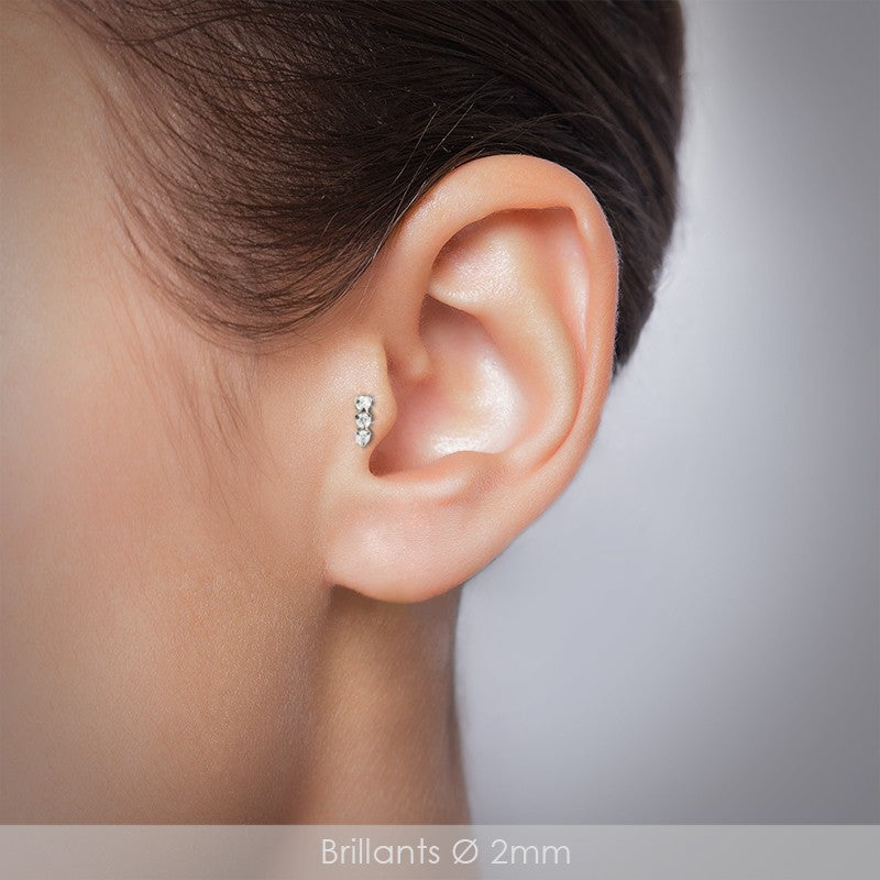 Piercing oreille or blanc avec 3 zircons